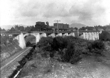 FA Loco crossing Waihi Gold Co rake line on the Mangatoetoe Bridge.