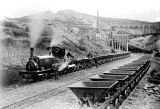 "Ohinemuri" and rake of full trucks at No.1 Shaft Hoppers. 1900